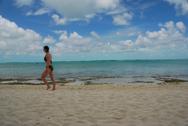 #2 Author walking on the beach at Tiamo